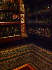 Every wall in every room had cabinets covering it. These were completely filled with collectibles of all kinds. It was nuts!