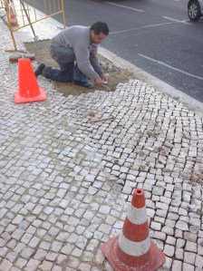 It is remarkable that the city keeps these stone sidewalks maintained. Laying rocks seems so tedious but two workers were adding rocks very quickly.