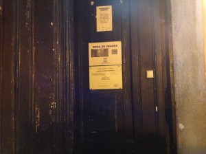 The sign on the huge, old restaurant doors