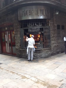 Saw this guy cooking rotisserie chicken outside his shop